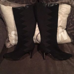 Tall black heeled boots